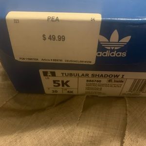 Adorable Adidas tennis shoes for an infant girl or boy.